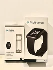 Fitbit Versa Smart Watch, Black/Black Aluminium, Plus White Replacement Band