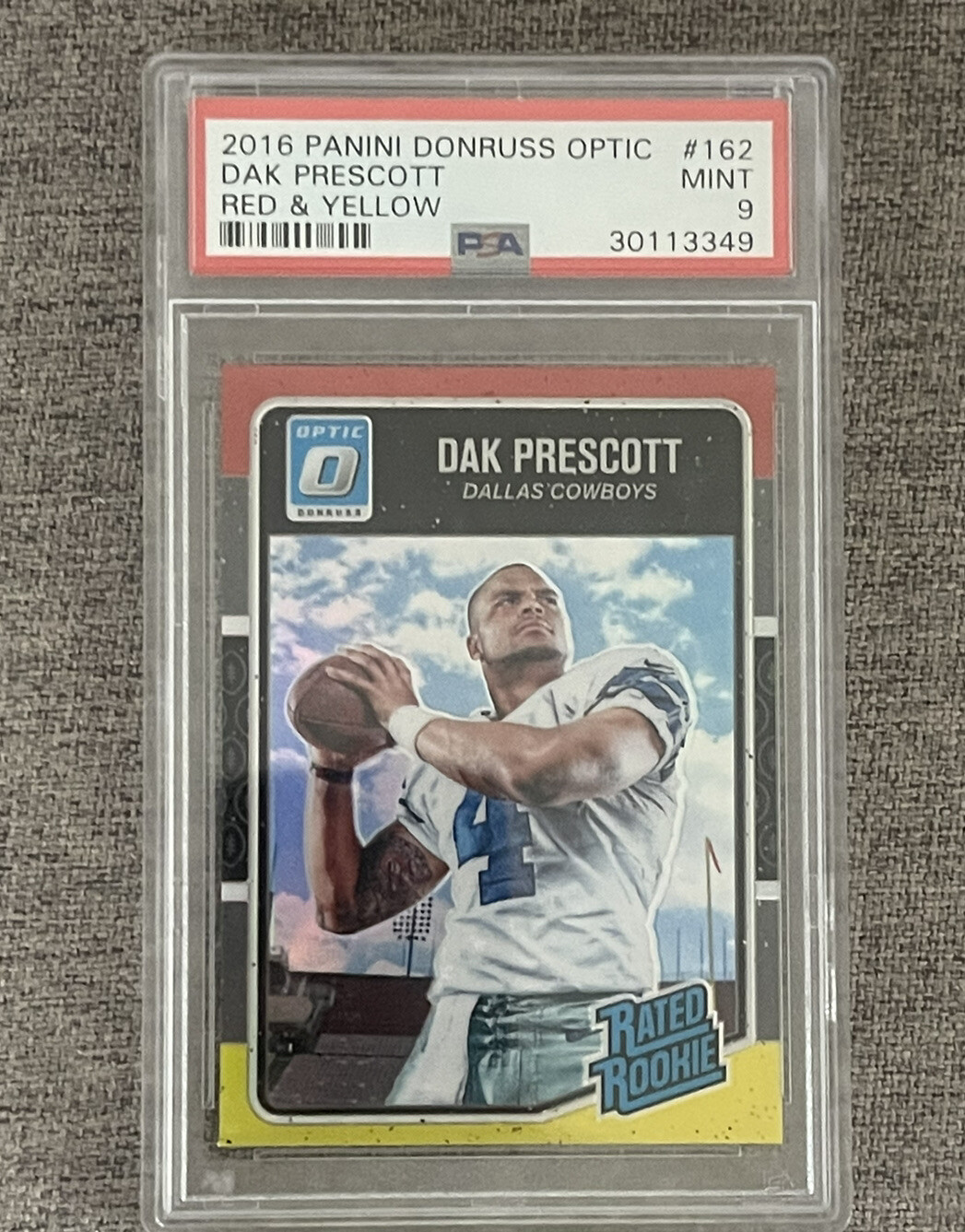 2016 Panini Donruss Optic Dak Prescott #162 Red & Yellow Prizm Rookie PSA 9