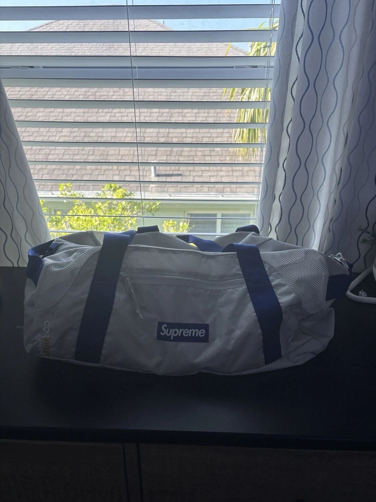 sac de sport suprême bleu et blanc 