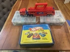 95 Vintage Hot wheels With 1986 Semi Truck, 1986 48 Car Case, And Two Cases