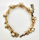 Crown Trifari Gold Tone Pearl Bow Bracelet – Vintage Costume Jewelry-New