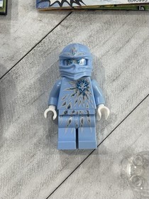 LEGO Ninjago: NRG Zane (9590)Minifigure w/ some weapons and spinner