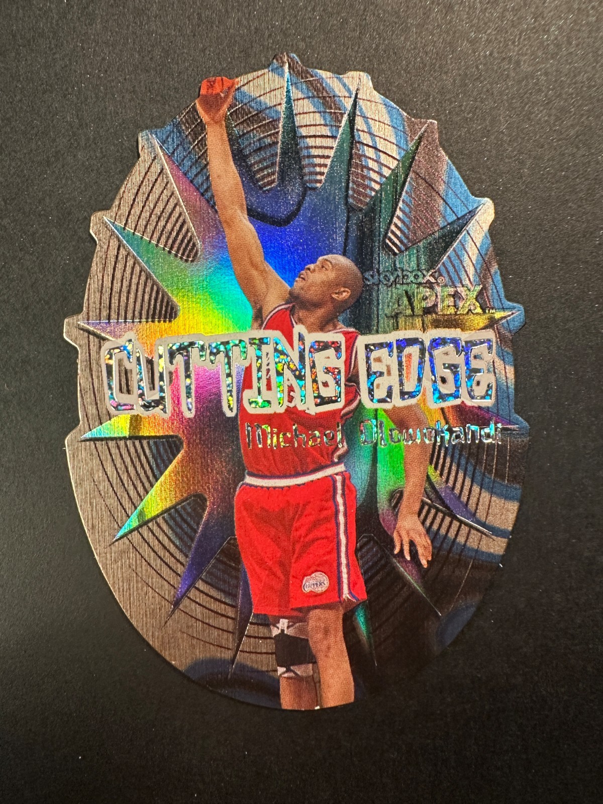 1999-00 Skybox Apex Cutting Edge PLUS Michael Olowokandi #12CE Clippers