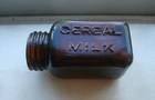 Vintage Early 1900's Four-Sided Amber Glass CEREAL MILK Bottle