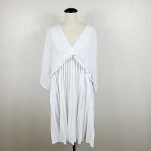 white pleated smock dress