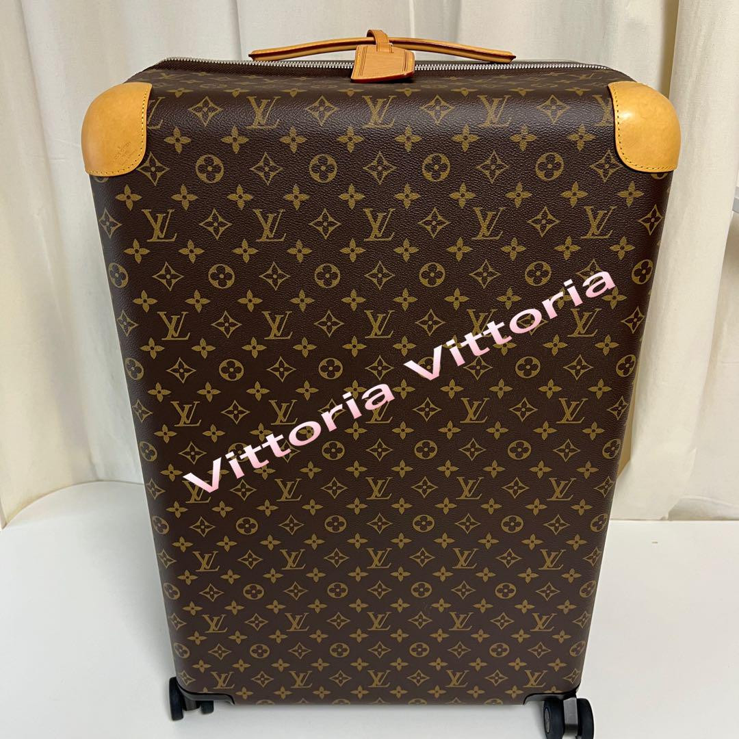 Louis Vuitton Horizon 70 suitcase with cloth cover