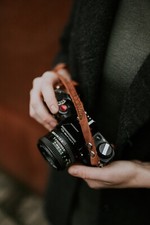 Minimalist leather camera strap for mirrorless or film camera