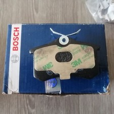 BOSCH Plaquettes de freins arrières AUDI / volkswagen + 1 paire de ridex