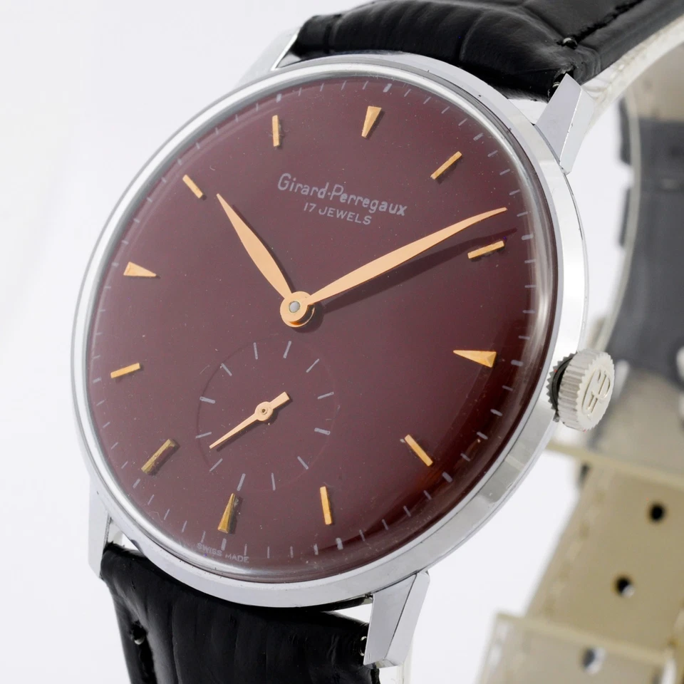 RELOJ DE VESTIR SUIZO GENUINO GIRARD PERREGAUX CUERDA MANUAL BONITO ESFERA BORGOÑA Foto 3 de 4
