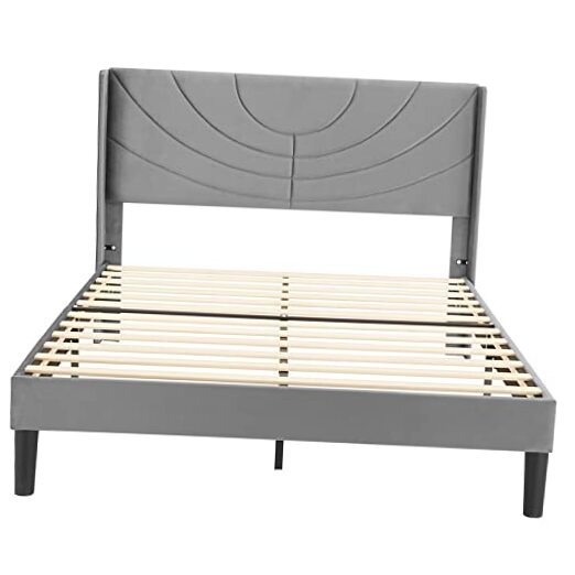 Full size upholstered platform bed with fabric headboard and wooden slats