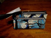 Womens Kenneth Cole Reaction Tech Device Wallet Floral/black $60.00 Womens Kenneth Cole Reaction Tech Device Wallet Floral/black $60.00