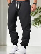 Men's Solid Color Regular Fit And Cuffed Sweatpants With Drawstring And Pockets