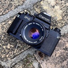 Canon New F-1 35mm SLR Film Camera w/ Canon FD 50mm f/1.8 lens metered prism