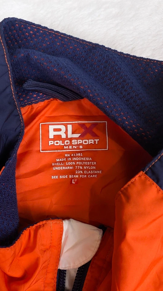 Chaqueta cortavientos deportiva RLX Polo para hombre grande naranja empaquetable Foto 4 de 4