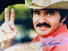 BURT REYNOLDS SIGNED 11X14 METALLIC PHOTO SMOKEY AND THE BANDIT AUTOGRAPH BAS 75