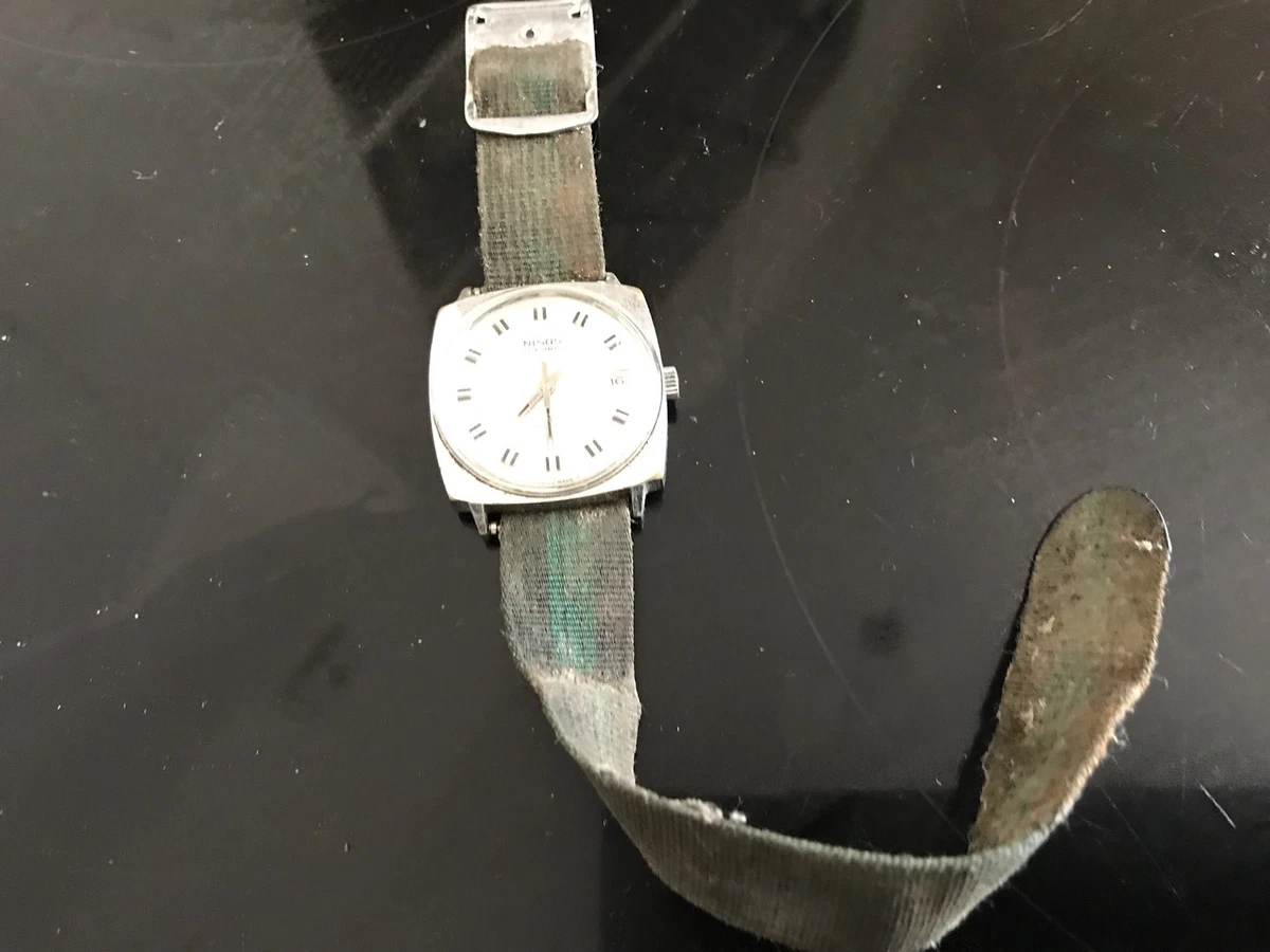 vintage gents wrist watch by Nisus Of Switzerland