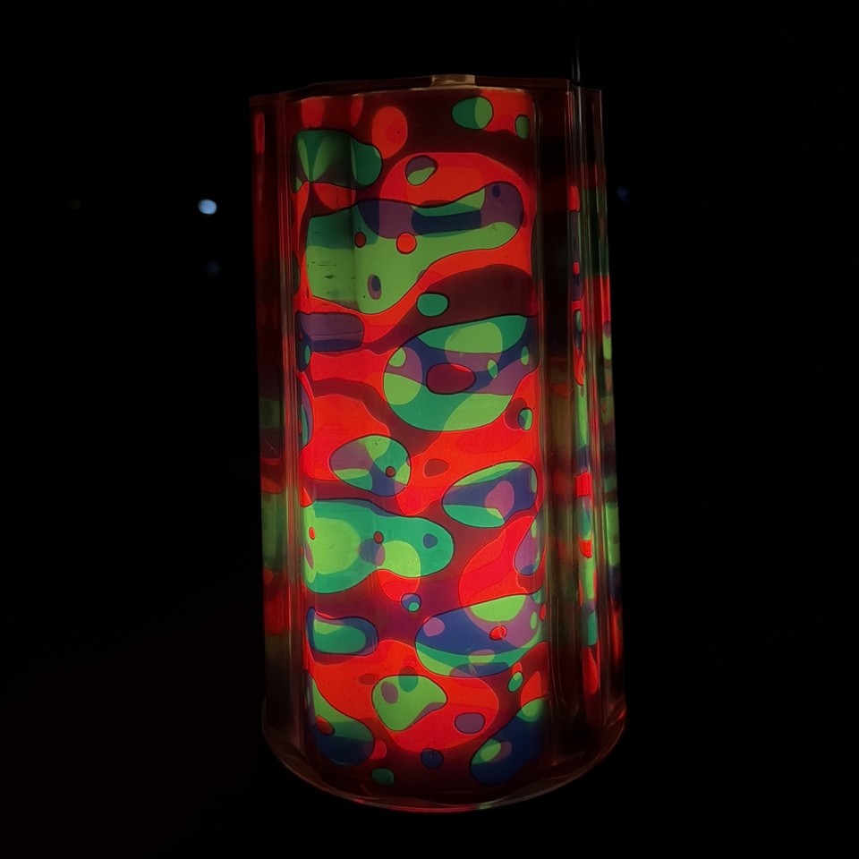 A tested, working 1990s Psychedelic Magma motion lamp — the 'Magma' brand is distinct from standard Lava lamps and carries serious retro cred.
