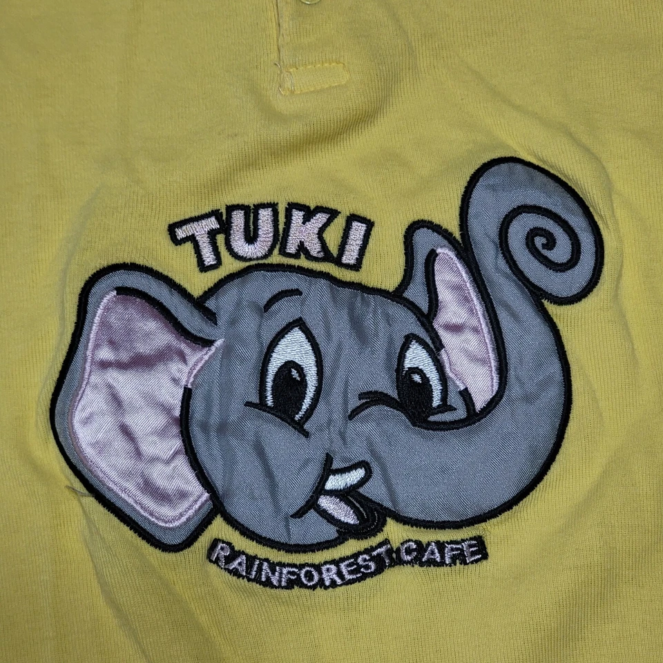 Body Rainforest Café Infantil Amarillo Con Capucha LS y Pierna Larga "Tuki" - Talla 18M Foto 2 de 4