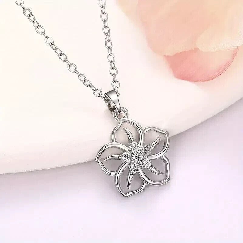 Round Cut Simulated Diamond Flower Pendant in 14K White Gold Plate