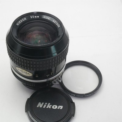 Nikon / NIKKOR 35mm F/1.4 Camera lens Japan made W/ filter & Caps