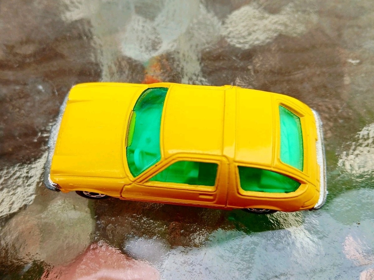 Vintage Tomica Pocket Car AMC Pacer X Coupe Yellow Near Mint Made
