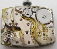 A Michel 50 Seeland 8 day manual nickel chrome tonneau watch for project or part