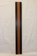 Figured mahogany, wenge and hard maple laminated guitar neck blank.