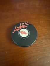 Andreas Athanasiou #72 Autographed Detroit Red Wings Hockey Puck
