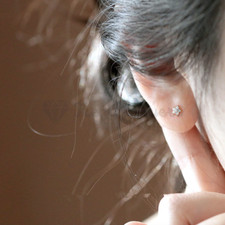 Pair of Diamond Cut Women Cartilage Flower Star  Stud Surgical Steel Earrings