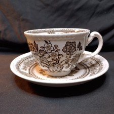 Antique Wood & Sons teacup and saucer duo features the "Dorset" pattern in brown