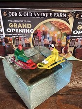 Vintage 2 Barclay Sled Cast Lead Figures Man Winter Village Sledding Red Woman