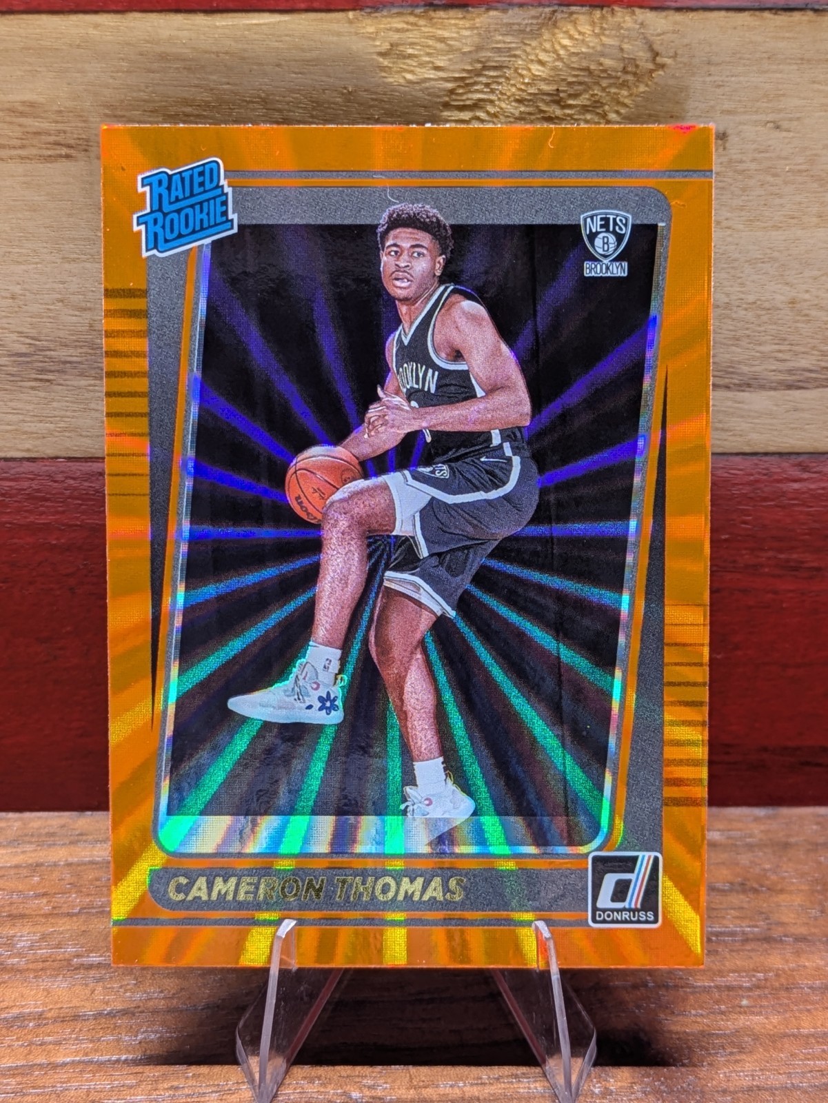 2021-22 Panini Donruss Cameron Thomas Orange Laser Holo Rated Rookie #203 Nets
