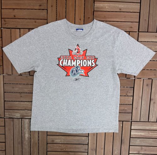 T-shirt vintage gris Toronto Argonauts 2004 Grey Cup Champions taille XL - Photo 1 sur 7