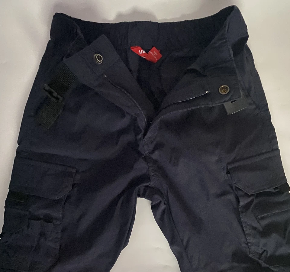 Pantalones cargo convertibles UNIONBAY para niños a pantalones cortos *SOLO PANTALONES CORTOS anuncio azul marino 7-8 S Foto 3 de 4