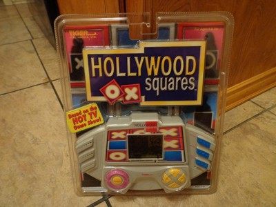 1999 TIGER ELECTRONICS--HOLLYWOOD SQUARES ELECTRONIC GAME (NEW)
