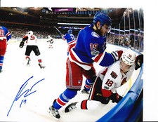JESPER FAST NEW YORK RANGERS SIGNED BATTLING ALONG BOARDS 8X10