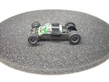 AFX RACING H.O. SCALE MEGA G 1.5 NARROW CHASSIS GRAY WHEEL SLOT CAR CHASSIS