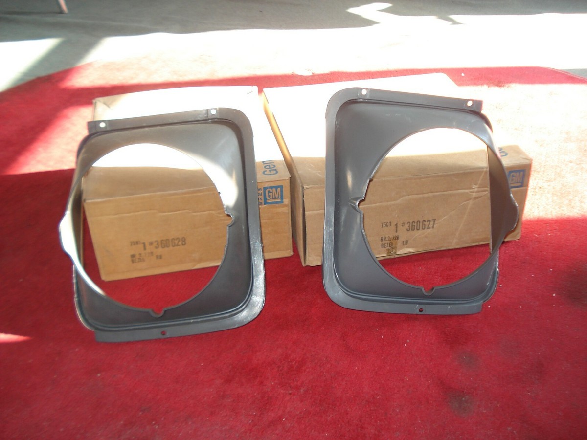 NOS 75-76-77-78 Chevy Nova SS Pair Headlight bezels 360627 360628