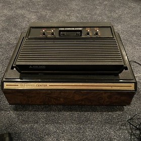 Atari 2600 Console With 16 Games, 4 Joysticks And 2 Paddles + Game Center