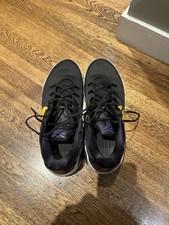 Nike Kobe 5 Protro black. On the back of the left shoe it  s torn.