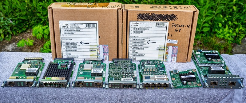 LOT OF 9 CISCO ROUTER MODULES: ESW, NIM T1/E1, FXS/DID, VICS3, PVDM4, PVDM3