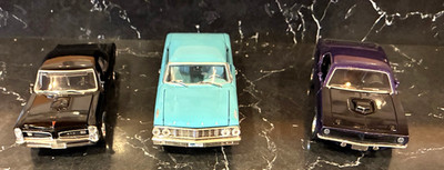 Pontiac GTO, 1964 Ford Galaxie and 1970 Cuda