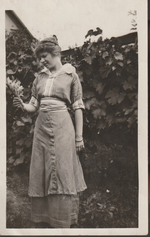 RPPC Woman with flowers Real Photo Post Card