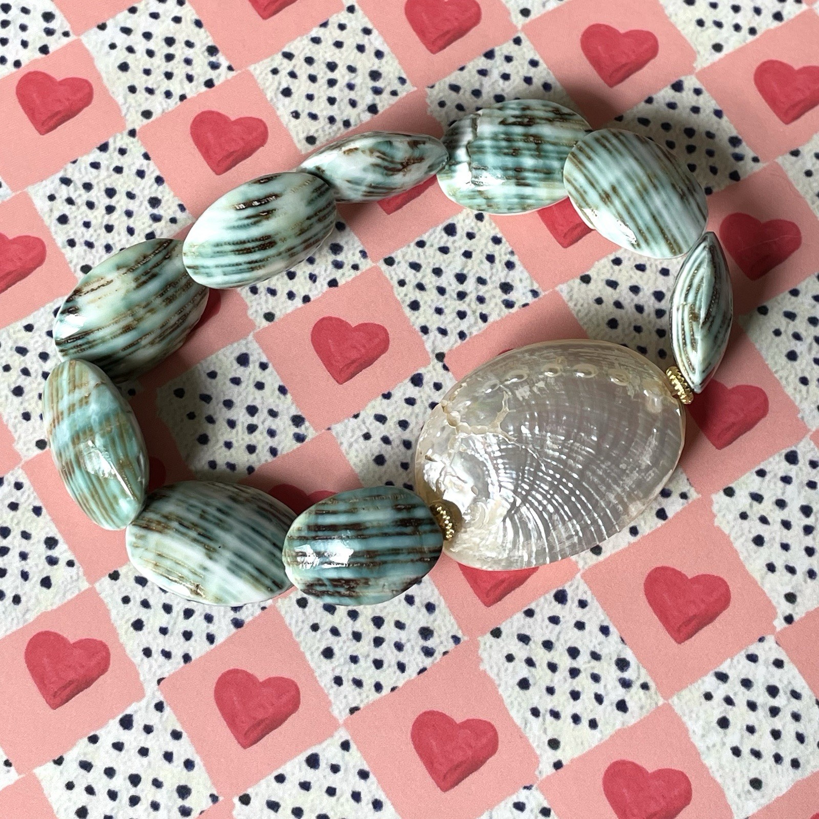 Turbo shell & silver abalone (?) shell stretch br… - image 1