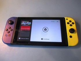 Nintendo Switch System 32GB Console w/Neon Yellow & Blue Joy-Cons +Case & Extras