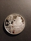 1 Troy Ounce .999 Fine Silver Trident Bullion Round. lot#1