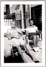 Vtg B&W Snapshot Shirtless Man & Woman Couple Sitting Outside Rv Trailer Circa