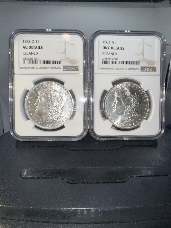Lot Of 2 Morgan Dollars 1882 O AU Details Cleaned & 1882 UNC Details Cleaned NGC