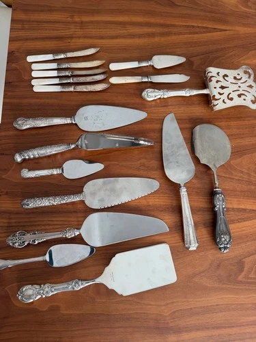 10 sterling silver cake and pie servers and 7 mop sterling silver banded knifes
