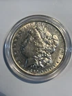 1889  $1 Morgan Silver Dollar in coin capsule uncirculated Philadelphia Mint